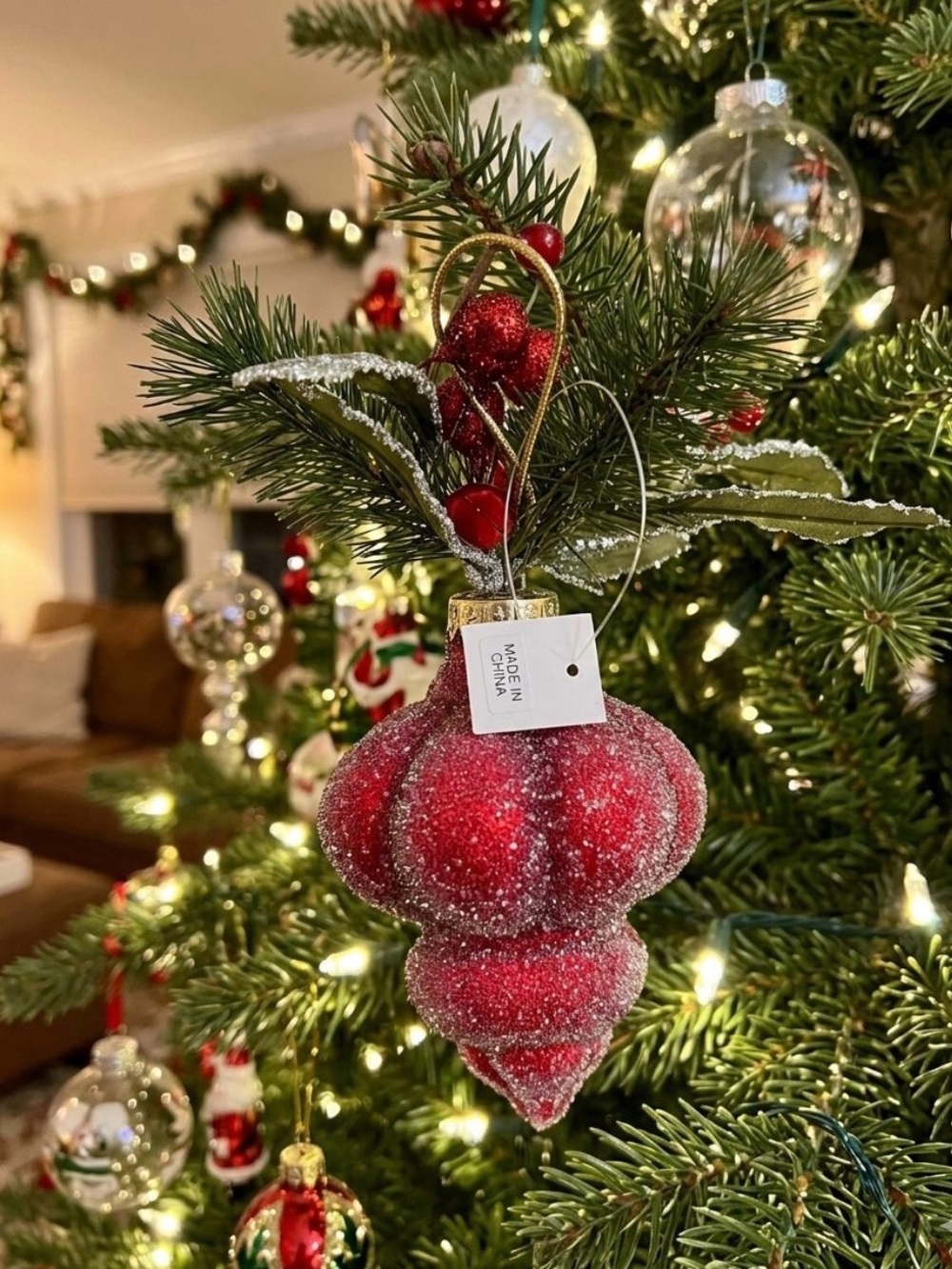 Christmas kinkornaments decorated with glitter, faux pine needles,frosted  berry